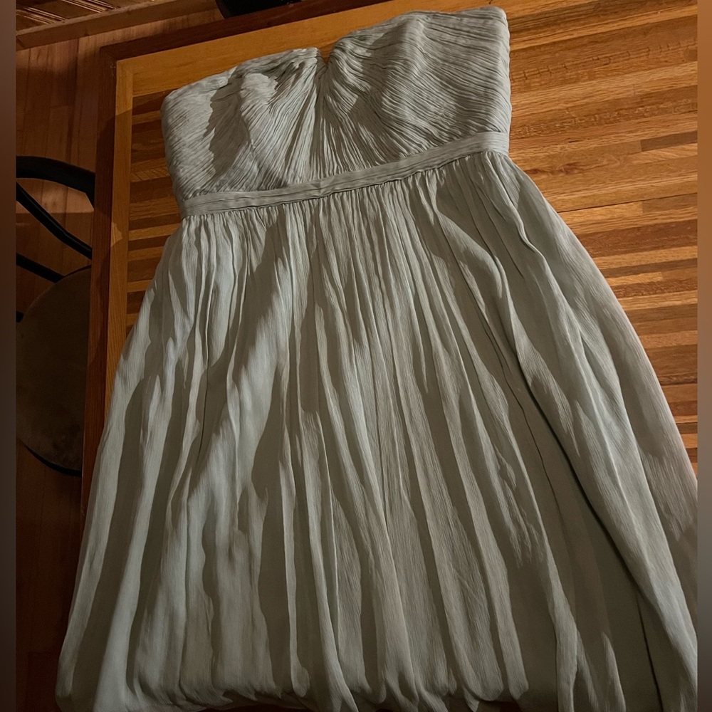 Green knee length formal dress
